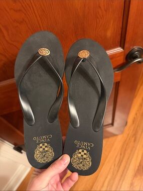 Vince Camuto Black Flip Flop Sandals with Gold Medallion